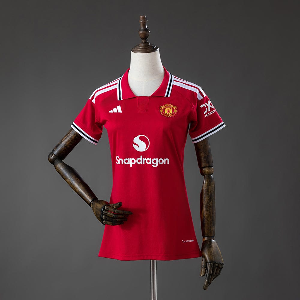 54d21e84.jpg Camiseta Manchester United Local 26/27
Mujer - Imagen 1