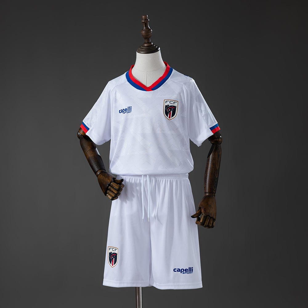 dd0a62ad.jpg Camiseta + Short Cabo Verde Visitante
26/27 Niños - Imagen 1